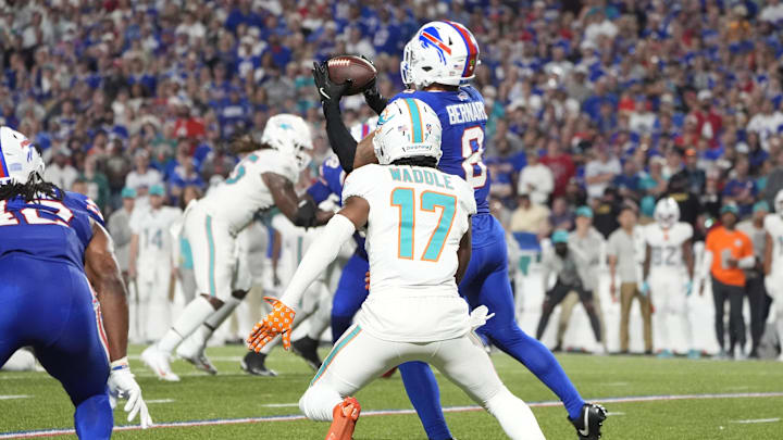 Bills linebacker Terrel Bernard (8) intercepts the ball in front of Dolphins wide receiver Jaylen Waddle (17) Thursday night Bills linebacker Terrel Bernard (8) intercepts the ball in front of Dolphins wide receiver Jaylen Waddle (17) Thursday night