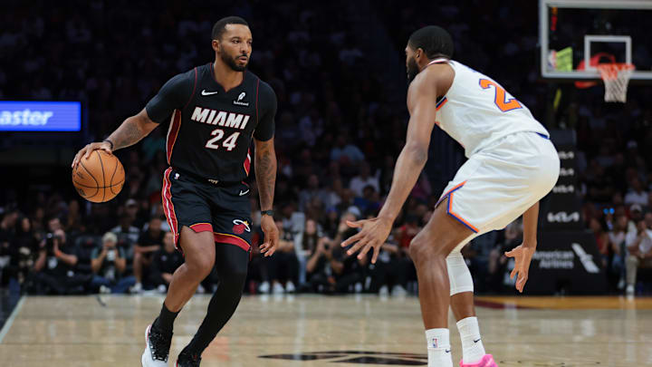 Oct 26, 2025; Miami, Florida, USA; Miami Heat guard Norman Powell (24) dribbles the basketball as New York Knicks guard Mikal Bridges (25) defends during the second quarter at Kaseya Center. Mandatory Credit: Sam Navarro-Imagn Images Oct 26, 2025; Miami, Florida, USA; Miami Heat guard Norman Powell (24) dribbles the basketball as New York Knicks guard Mikal Bridges (25) defends during the second quarter at Kaseya Center. Mandatory Credit: Sam Navarro-Imagn Images