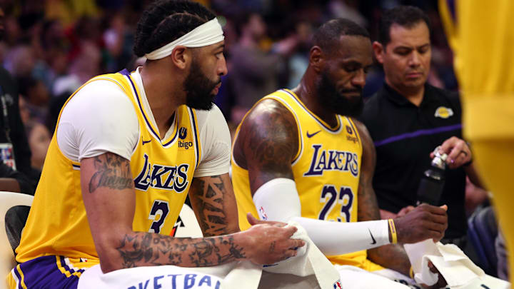 Apr 12, 2024; Memphis, Tennessee, USA; Los Angeles Lakers forward Anthony Davis (3) and forward LeBron James (23) sit on the bench during a time out during the second half against the Memphis Grizzlies at FedExForum. Mandatory Credit: Petre Thomas-Imagn Images Apr 12, 2024; Memphis, Tennessee, USA; Los Angeles Lakers forward Anthony Davis (3) and forward LeBron James (23) sit on the bench during a time out during the second half against the Memphis Grizzlies at FedExForum. Mandatory Credit: Petre Thomas-Imagn Images