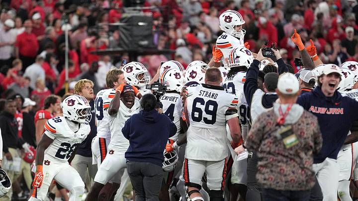 Oct 17, 2026; Athens, Georgia, USA; Auburn celebrates following a game-winning field goal by Auburn kicker Alex McPherson (38) during the fourth quarter against Georgia at Sanford Stadium. Mandatory Credit: Dale Zanine-Imagn Images Oct 17, 2026; Athens, Georgia, USA; Auburn celebrates following a game-winning field goal by Auburn kicker Alex McPherson (38) during the fourth quarter against Georgia at Sanford Stadium. Mandatory Credit: Dale Zanine-Imagn Images