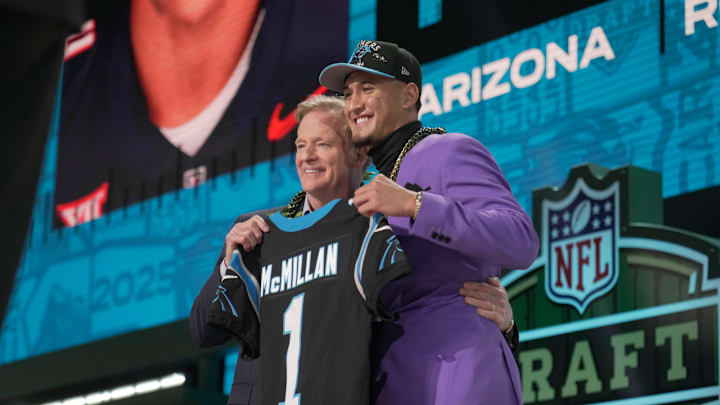 NFL Commissoner Rodger Goodell, left, with Arizona Wildcats wide receiver Tetairoa McMillan selected by the Carolina Panthers as the number eight pick in the first round of the 2025 NFL Draft at Lambeau Field.
