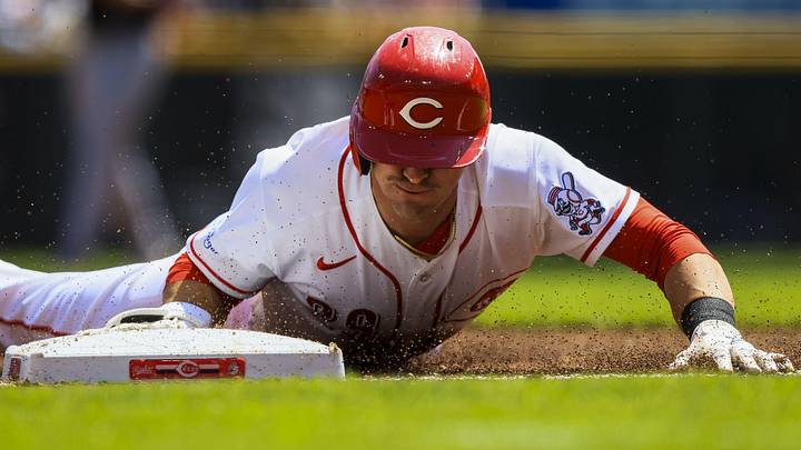 Cincinnati Reds outfielder TJ Friedl (29) slides into third