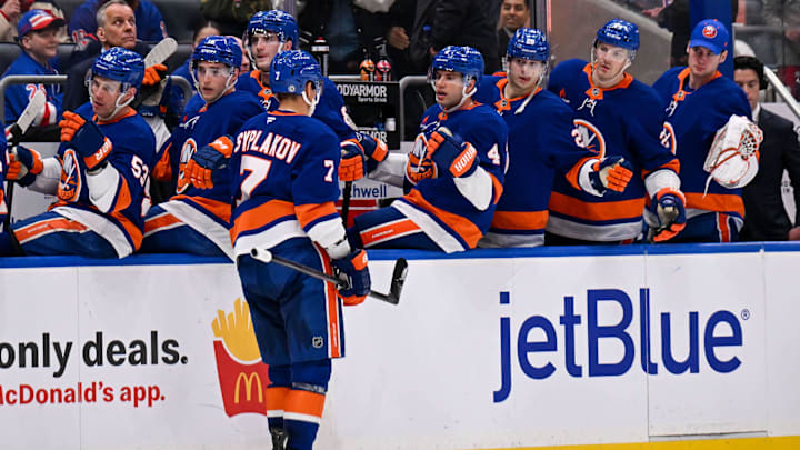 Apr 10, 2025; Elmont, New York, USA;  New York Islanders right wing Maxim Tsyplakov (7) celebrates his power play goal against the New York Rangers during the second period at UBS Arena. Mandatory Credit: Dennis Schneidler-Imagn Images
