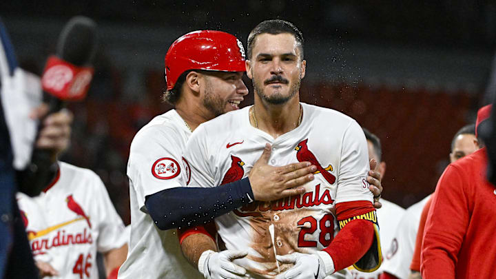 Aug 21, 2024; St. Louis, Missouri, USA;  St. Louis Cardinals third baseman Nolan Arenado (28) celebrates with catcher Willson Contreras (40) after hitting a walk-off grand slam against the Milwaukee Brewers during the tenth inning at Busch Stadium. Mandatory Credit: Jeff Curry-Imagn Images