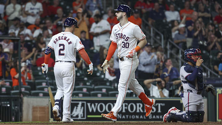 Apr 16, 2024; Houston, Texas, USA; Houston Astros right fielder Kyle Tucker (30) celebrates with third baseman Alex Bregman (2) after hitting a home run during the ninth inning against the Atlanta Braves at Minute Maid Park. Apr 16, 2024; Houston, Texas, USA; Houston Astros right fielder Kyle Tucker (30) celebrates with third baseman Alex Bregman (2) after hitting a home run during the ninth inning against the Atlanta Braves at Minute Maid Park.