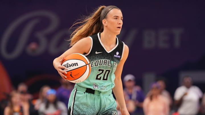Sep 19, 2025; Phoenix, Arizona, USA; New York Liberty guard Sabrina Ionescu (20) dribbles against the Phoenix Mercury during the first half of game three of round one for the 2025 WNBA Playoffs at PHX Arena. Mandatory Credit: Joe Camporeale-Imagn Images Sep 19, 2025; Phoenix, Arizona, USA; New York Liberty guard Sabrina Ionescu (20) dribbles against the Phoenix Mercury during the first half of game three of round one for the 2025 WNBA Playoffs at PHX Arena. Mandatory Credit: Joe Camporeale-Imagn Images