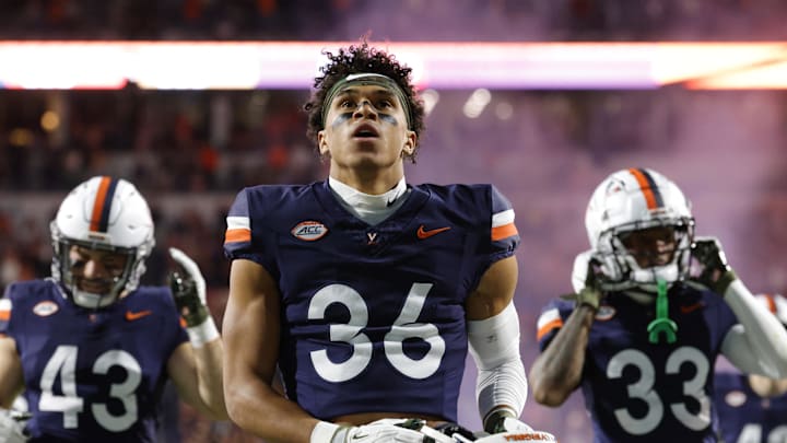 Nov 8, 2025; Charlottesville, Virginia, USA; Virginia Cavaliers safety Caleb Hardy (26) looks on from the field prior to the game against the Wake Forest Demon Deacons at Scott Stadium. Mandatory Credit: Amber Searls-Imagn Images