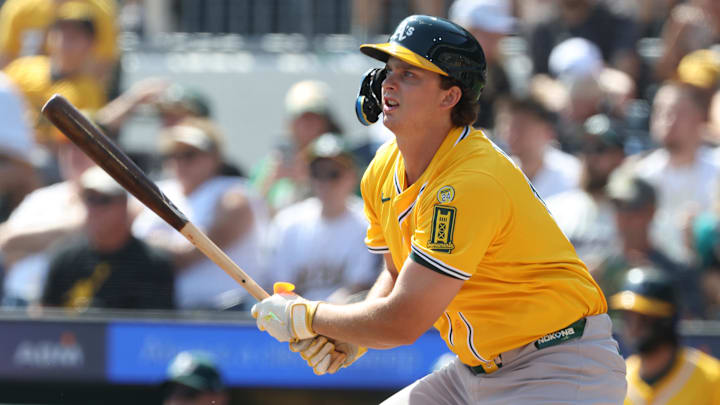 Sep 21, 2025; Pittsburgh, Pennsylvania, USA;  Athletics first baseman Nick Kurtz (16) hits a single against the Pittsburgh Pirates during the first inning at PNC Park. Mandatory Credit: Charles LeClaire-Imagn Images