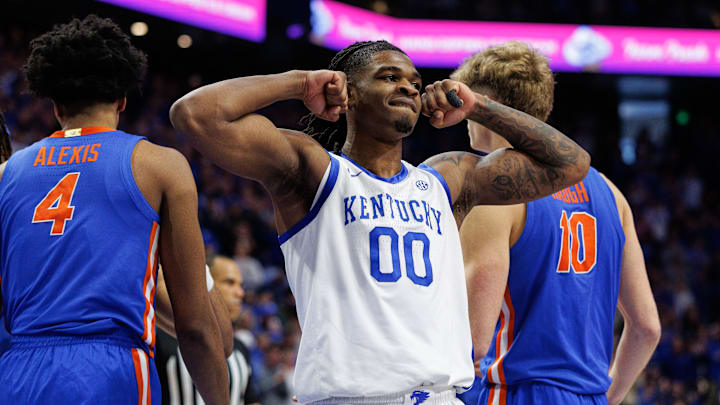 Jan 4, 2025; Lexington, Kentucky, USA; Kentucky Wildcats guard Otega Oweh (0) celebrates a basket by center Amari Williams during the second half against the Florida Gators at Rupp Arena at Central Bank Center. Mandatory Credit: Jordan Prather-Imagn Images Jan 4, 2025; Lexington, Kentucky, USA; Kentucky Wildcats guard Otega Oweh (0) celebrates a basket by center Amari Williams during the second half against the Florida Gators at Rupp Arena at Central Bank Center. Mandatory Credit: Jordan Prather-Imagn Images