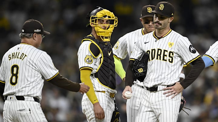 Oct 9, 2024; San Diego, California, USA; San Diego Padres manager Mike Shildt (8) takes out pitcher Dylan Cease (84) in the second inning against the Los Angeles Dodgers during game four of the NLDS for the 2024 MLB Playoffs at Petco Park. Mandatory Credit: Denis Poroy-Imagn Images Oct 9, 2024; San Diego, California, USA; San Diego Padres manager Mike Shildt (8) takes out pitcher Dylan Cease (84) in the second inning against the Los Angeles Dodgers during game four of the NLDS for the 2024 MLB Playoffs at Petco Park. Mandatory Credit: Denis Poroy-Imagn Images