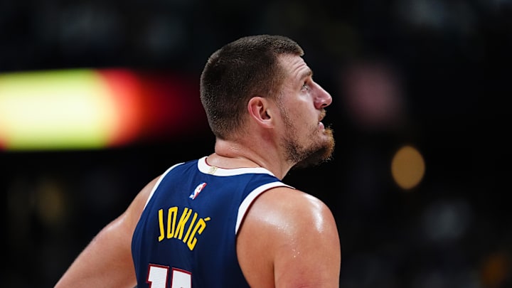 Nov 10, 2024; Denver, Colorado, USA; Denver Nuggets center Nikola Jokic (15) reacts in the first half against the Dallas Mavericks at Ball Arena. 