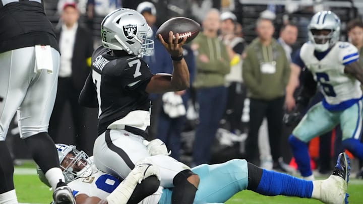 Nov 17, 2025; Paradise, Nevada, USA; Dallas Cowboys defensive tackle Osa Odighizuwa (97) pressures Las Vegas Raiders quarterback Geno Smith (7) during the second half at Allegiant Stadium. Mandatory Credit: Kirby Lee-Imagn Images