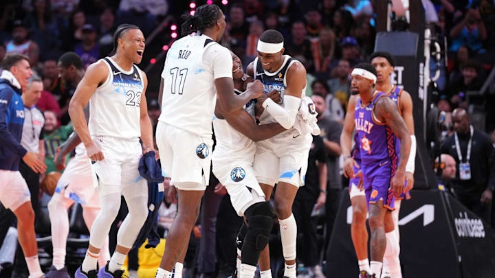 Mar 2, 2025; Phoenix, Arizona, USA; Minnesota Timberwolves players celebrate against the Phoenix Suns during the second half at Footprint Center.
