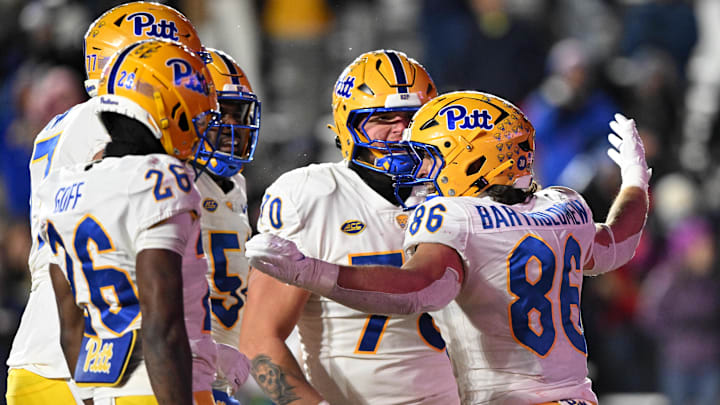 Nov 30, 2024; Chestnut Hill, Massachusetts, USA; Pittsburgh Panthers tight end Gavin Bartholomew (86) celebrates with his teammates after scoring a touchdown against the Boston College Eagles during the second half at Alumni Stadium. Mandatory Credit: Brian Fluharty-Imagn Images Nov 30, 2024; Chestnut Hill, Massachusetts, USA; Pittsburgh Panthers tight end Gavin Bartholomew (86) celebrates with his teammates after scoring a touchdown against the Boston College Eagles during the second half at Alumni Stadium. Mandatory Credit: Brian Fluharty-Imagn Images