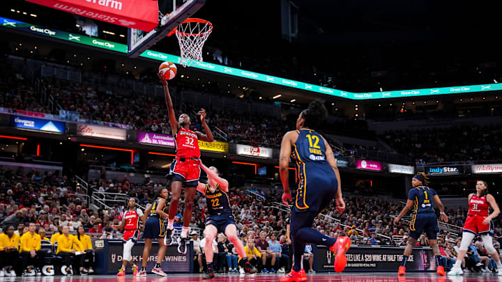Washington Mystics guard Shatori Walker-Kimbrough (32) goes up for a layup Wednesday, July 10, 2024, during the game at Gainbridge Fieldhouse in Indianapolis.