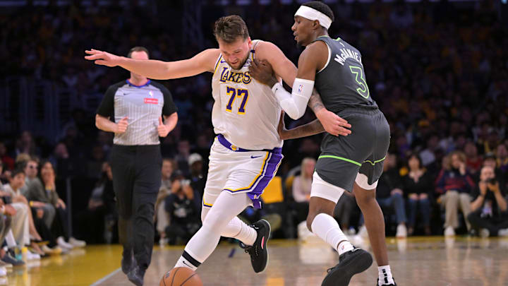 Los Angeles Lakers guard Luka Doncic is fouled by Minnesota Timberwolves forward Jaden McDaniels in the first quarter at Crypto.com Arena in Los Angeles on April 19, 2025. Los Angeles Lakers guard Luka Doncic is fouled by Minnesota Timberwolves forward Jaden McDaniels in the first quarter at Crypto.com Arena in Los Angeles on April 19, 2025.
