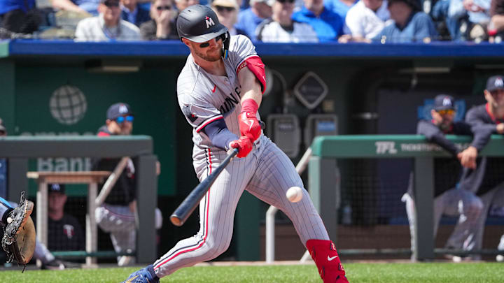 Minnesota Twins catcher Ryan Jeffers hits an RBI single against the Kansas City Royals in the sixth inning at Kauffman Stadium in Kansas City, Mo., on April 10, 2025. 