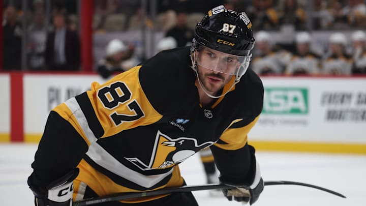Apr 13, 2025; Pittsburgh, Pennsylvania, USA;  Pittsburgh Penguins center Sidney Crosby (87) looks on before a face-off against the Boston Bruins during the third period at PPG Paints Arena. Mandatory Credit: Charles LeClaire-Imagn Images