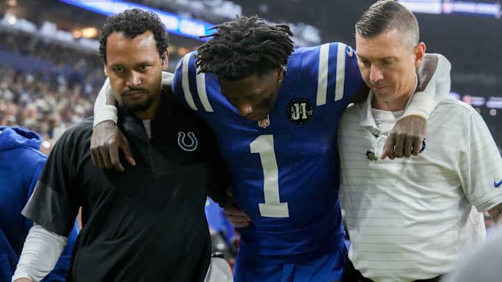 Indianapolis Colts cornerback Sauce Gardner (1) is helped off the field following an injury Sunday, Nov. 30, 2025, during a game against the Houston Texans at Lucas Oil Stadium in Indianapolis.