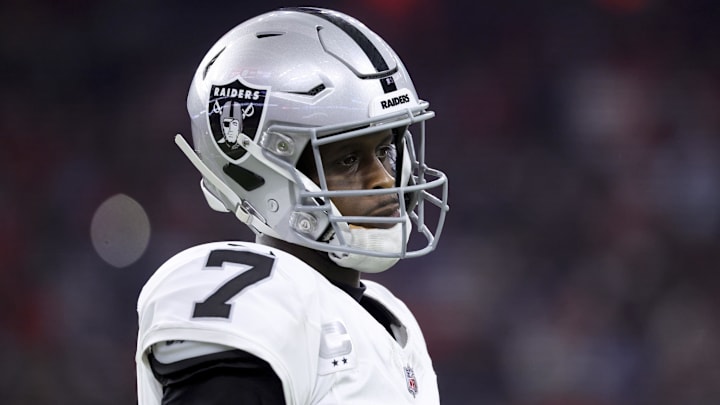 Dec 21, 2025; Houston, Texas, USA; Las Vegas Raiders quarterback Geno Smith (7) looks towards the sideline during the game against the Houston Texans at NRG Stadium. Mandatory Credit: Troy Taormina-Imagn Images
