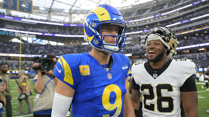 Nov 2, 2025; Inglewood, California, USA; Los Angeles Rams quarterback Matthew Stafford (9) and New Orleans Saints safety Terrell Burgess (26) talk following a game at SoFi Stadium. Mandatory Credit: Jayne Kamin-Oncea-Imagn Images