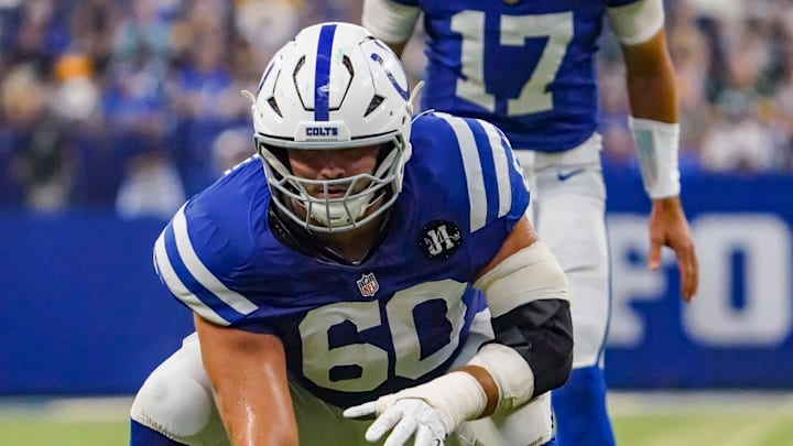 Indianapolis Colts guard Tanor Bortolini (60) hikes the ball to Indianapolis Colts quarterback Daniel Jones (17) on Saturday, Aug. 16, 2025, during a game against the Green Bay Packers at Lucas Oil Stadium in Indianapolis.