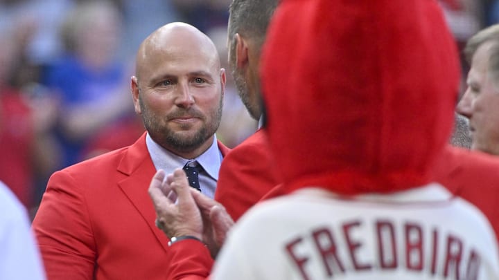 Aug 27, 2022; St. Louis, Missouri, USA; Former St. Louis Cardinals outfielder Matt Holliday celebrates with members of the Cardinals Red Jacket Club after he was inducted into the Cardinals Hall of Fame at Busch Stadium. Mandatory Credit: Jeff Curry-Imagn Images