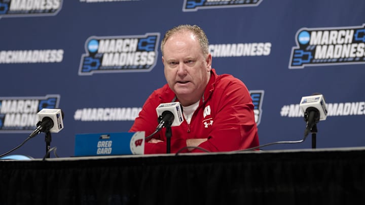Mar 18, 2026; Portland, OR, USA; Wisconsin Badgers head coach Greg Gard answers questions during a press conference before a practice session ahead of the first round of the men's 2026 NCAA Tournament at Moda Center. Mandatory Credit: Troy Wayrynen-Imagn Images