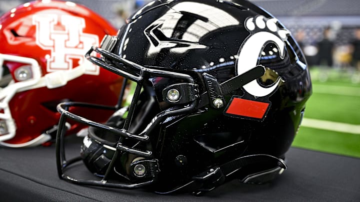 Jul 12, 2023; Arlington, TX, USA; A view of the Cincinnati Bearcats helmet and logo during Big 12 football media day at AT&T Stadium. Mandatory Credit: Jerome Miron-Imagn Images