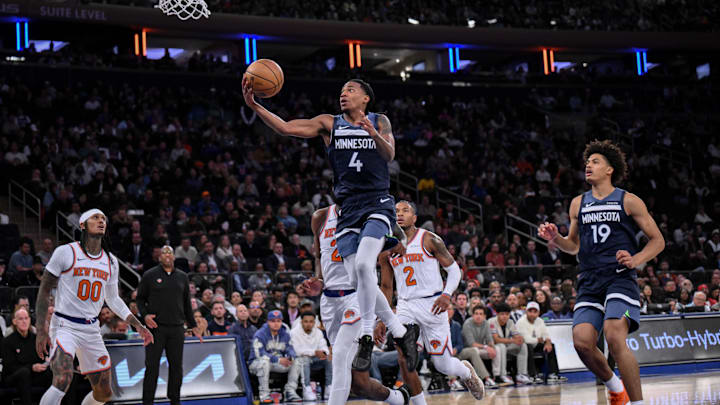 Oct 9, 2025; New York, New York, USA; Minnesota Timberwolves guard Rob Dillingham (4) drives to the basket  against the New York Knicks during the first half at Madison Square Garden. Mandatory Credit: John Jones-Imagn Images