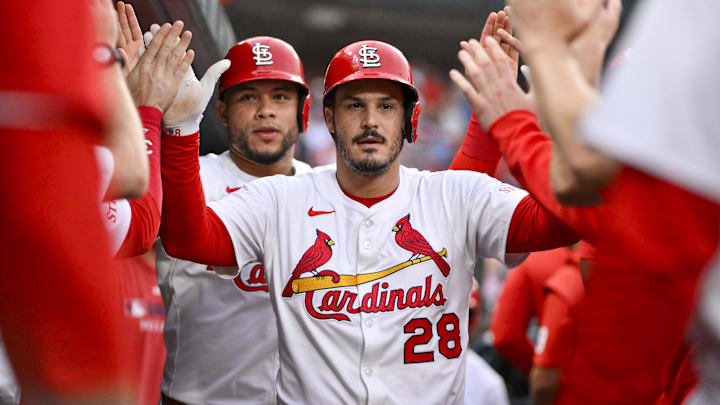 Jun 5, 2025; St. Louis, Missouri, USA;  St. Louis Cardinals third baseman Nolan Arenado (28) is congratulated by teammates after hitting a two run home run against the Kansas City Royals during the third inning at Busch Stadium. Mandatory Credit: Jeff Curry-Imagn Images