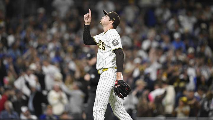 May 18, 2026; San Diego, California, USA; San Diego Padres pitcher Mason Miller (22) points skyward after the Padres beat the Los Angeles Dodgers at Petco Park. Mandatory Credit: Denis Poroy-Imagn Images May 18, 2026; San Diego, California, USA; San Diego Padres pitcher Mason Miller (22) points skyward after the Padres beat the Los Angeles Dodgers at Petco Park. Mandatory Credit: Denis Poroy-Imagn Images