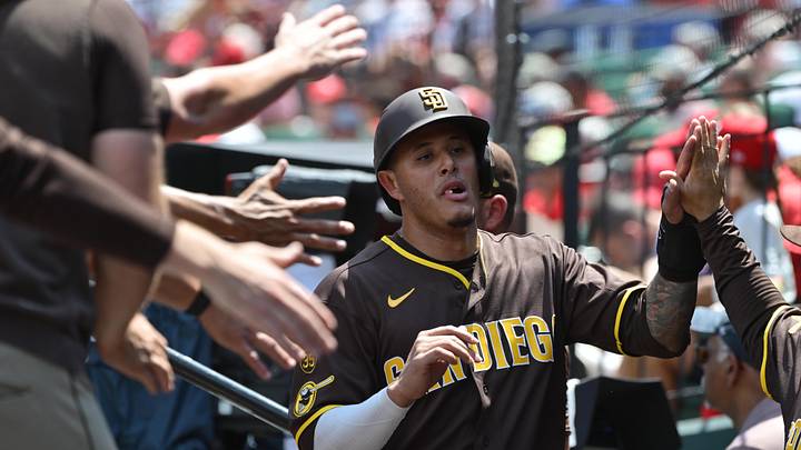 Jun 17, 2026; St. Louis, Missouri, USA; San Diego Padres third baseman Manny Machado (13) is congratulated in the dugout by teammates after scoring against the St. Louis Cardinals in the fourth inning at Busch Stadium. Mandatory Credit: Tim Vizer-Imagn Images Jun 17, 2026; St. Louis, Missouri, USA; San Diego Padres third baseman Manny Machado (13) is congratulated in the dugout by teammates after scoring against the St. Louis Cardinals in the fourth inning at Busch Stadium. Mandatory Credit: Tim Vizer-Imagn Images