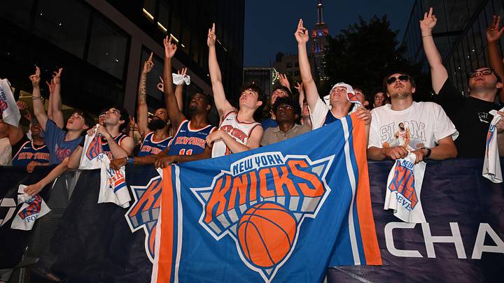 New York Knicks fans celebrate during the watch party outside of Madison Square Garden on Plaza 33 during Game 5 of the NBA Finals. New York Knicks fans celebrate during the watch party outside of Madison Square Garden on Plaza 33 during Game 5 of the NBA Finals.