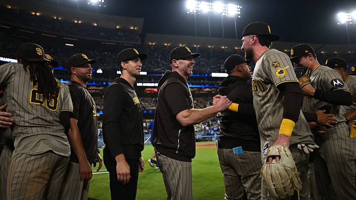 Sep 24, 2026; Los Angeles, California, USA; San Diego Padres center fielder Jackson Merrill (3) is greeted by teammates after defeating the Los Angeles Dodgers at Dodger Stadium. Mandatory Credit: William Liang-Imagn Images Sep 24, 2026; Los Angeles, California, USA; San Diego Padres center fielder Jackson Merrill (3) is greeted by teammates after defeating the Los Angeles Dodgers at Dodger Stadium. Mandatory Credit: William Liang-Imagn Images
