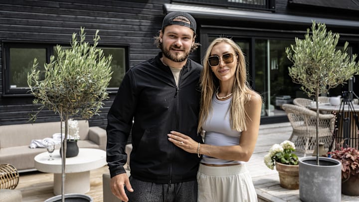 Calgary Flames captain Rasmus Andersson poses with his wife, Tessa. Calgary Flames captain Rasmus Andersson poses with his wife, Tessa.