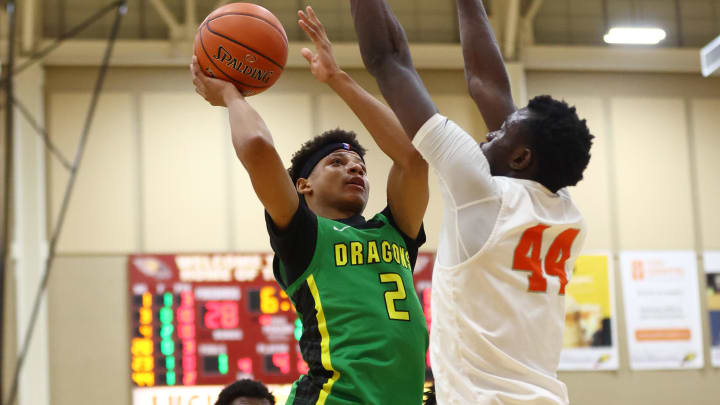 Dec 1, 2023; Scottsdale, AZ, USA; Arizona Compass Prep guard Jeremiah Fears (2) drives to the basket against Wasatch Academy center Augustine Ekwe (44) during the Hoophall West High School Invitational at Chaparral High School. Mandatory Credit: Mark J. Rebilas-USA TODAY Sports Dec 1, 2023; Scottsdale, AZ, USA; Arizona Compass Prep guard Jeremiah Fears (2) drives to the basket against Wasatch Academy center Augustine Ekwe (44) during the Hoophall West High School Invitational at Chaparral High School. Mandatory Credit: Mark J. Rebilas-USA TODAY Sports