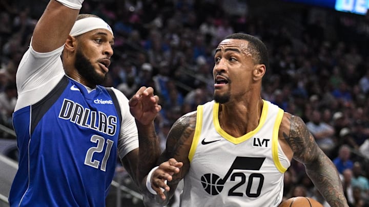 Oct 28, 2024; Dallas, Texas, USA; Dallas Mavericks center Daniel Gafford (21) and Utah Jazz forward John Collins (20) in action during the game between the Dallas Mavericks and the Utah Jazz at the American Airlines Center. Mandatory Credit: Jerome Miron-Imagn Images