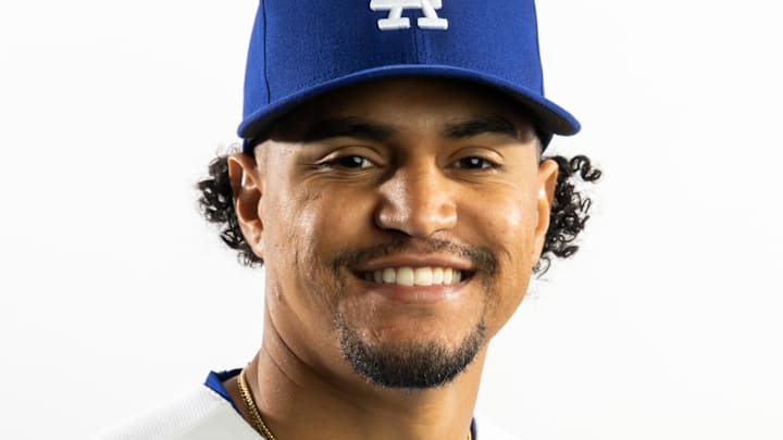 Feb 19, 2026; Glendale, AZ, USA; Los Angeles Dodgers infielder Santiago Espinal poses for a portrait during photo day at Camelback Ranch. Mandatory Credit: Mark J. Rebilas-Imagn Images