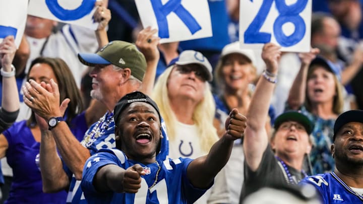 Fans celebrate a touchdown by Indianapolis Colts running back Jonathan Taylor (28) on Sunday, Oct. 5, 2025, during a game against the Las Vegas Raiders at Lucas Oil Stadium in Indianapolis. The Indianapolis Colts defeated the Las Vegas Raiders, 40-6.