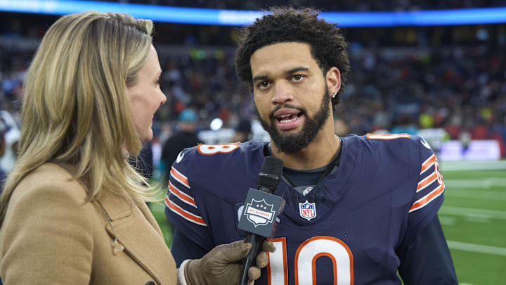 Oct 13, 2024; London, United Kingdom; Stacey Dales, NFL Network reporter, and Chicago Bears quarterback Caleb Williams (18) after an NFL International Series game at Tottenham Hotspur Stadium. Mandatory Credit: Peter van den Berg-Imagn Images