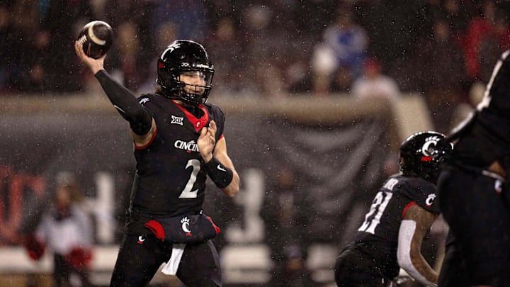 Nov 30, 2024; Cincinnati, Ohio, USA; Cincinnati Bearcats quarterback Brendan Sorsby (2) throws a pass against the TCU Horned Frogs in the third quarter at Nippert Stadium. Mandatory Credit: Albert Cesare/USA TODAY Network via Imagn Images