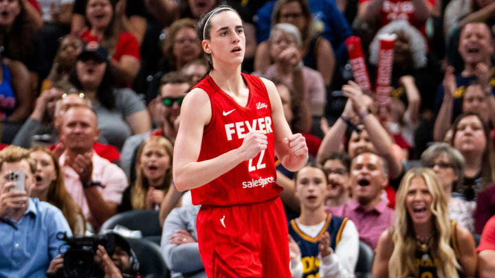 Indiana Fever guard Caitlin Clark celebrates scoring during a game on July 6 at Gainbridge Fieldhouse in Indianapolis.