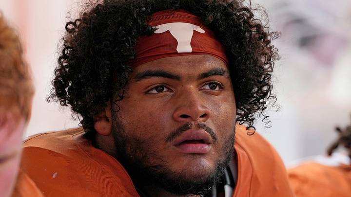 Texas Longhorns offensive lineman Trevor Goosby (74) rests during a game against the Texas El Paso Miners at Darrell K Royal-Texas Memorial Stadium. Texas Longhorns offensive lineman Trevor Goosby (74) rests during a game against the Texas El Paso Miners at Darrell K Royal-Texas Memorial Stadium.