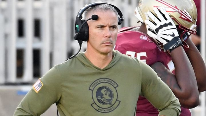 Nov 2, 2024; Tallahassee, Florida, USA; Florida State Seminoles head coach Mike Norvell looks on from the sideline after the North Carolina Tarheels score a final touchdown in the fourth quarter at Doak S. Campbell Stadium. Mandatory Credit: Robert Myers-Imagn Images Nov 2, 2024; Tallahassee, Florida, USA; Florida State Seminoles head coach Mike Norvell looks on from the sideline after the North Carolina Tarheels score a final touchdown in the fourth quarter at Doak S. Campbell Stadium. Mandatory Credit: Robert Myers-Imagn Images