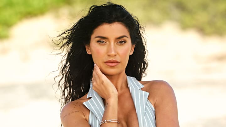 Nicole Williams English was photographed by Yu Tsai in Mexico. Swimsuit by Poster Girl Bracelets by Peace Diamonds.