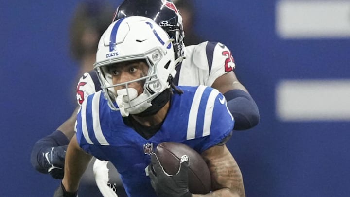 Jan 6, 2024; Indianapolis, Indiana, USA; Indianapolis Colts wide receiver Josh Downs (1) rushes the ball against the Houston Texans at Lucas Oil Stadium. Mandatory Credit: Robert Scheer-Imagn Images Jan 6, 2024; Indianapolis, Indiana, USA; Indianapolis Colts wide receiver Josh Downs (1) rushes the ball against the Houston Texans at Lucas Oil Stadium. Mandatory Credit: Robert Scheer-Imagn Images