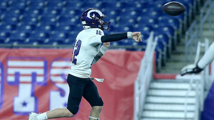 Shawsheen Tech's Sidney Tildsley passes on the run during fourth quarter action of their game against North Reading in the Division 5 Super Bowl at Gillette Stadium in Foxborough on Friday, Dec. 2, 2022.

Shawsheen Valley Tech North Reading Football State Title Trophy Gillette Stadium Super Bowl Miaa 2022