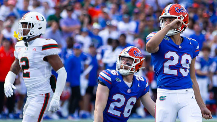 Florida Gators place kicker Trey Smack (29) watches his field goal go through the uprights during the season opener at Ben Hill Griffin Stadium in Gainesville, FL on Saturday, August 31, 2024 against the University of Miami Hurricanes in the first half. [Doug Engle/Gainesville Sun]