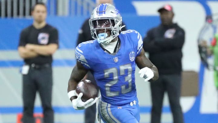Detroit Lions defender Jerry Jacobs (23) intercepts a pass by Carolina Panthers quarterback Bryce Young (9) during first-half action at Ford Field in Detroit on Sunday, Oct, 8, 2023.